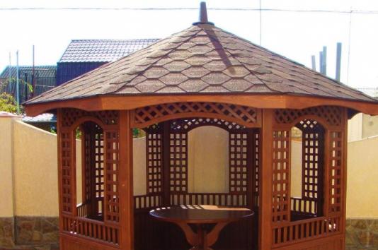 The option of a square wooden gazebo is suitable for any garden